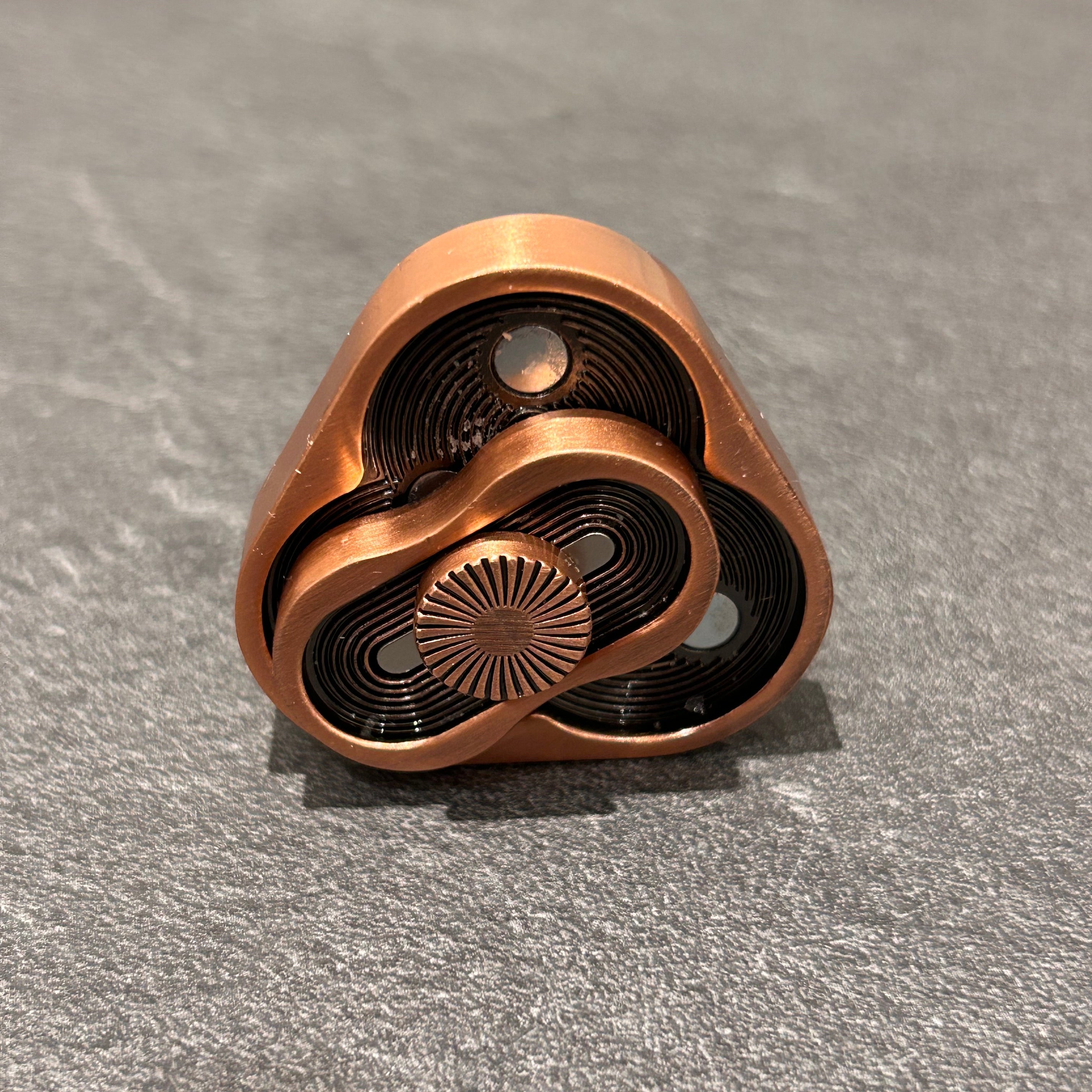 Detaljebillede af Cobber Metal Triangle Slider
